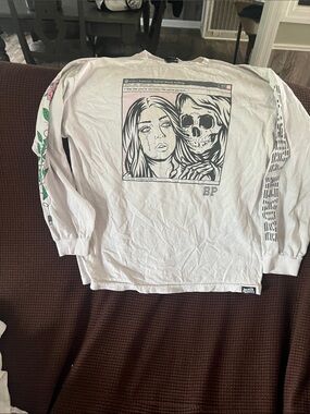 Graphic Long Sleeve Tee with Sketched Skull & Woman Broken Promises